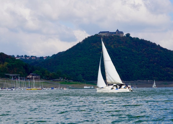sailing boats on the Edersee, the castle of Waldeck in the background