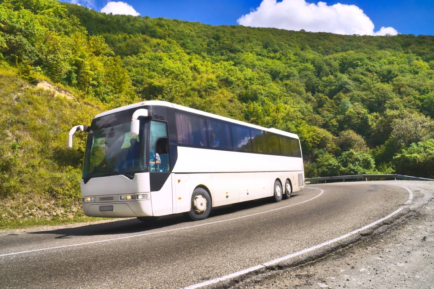 Bus driving on road